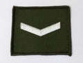 Lance Corporal Rank Badge White On Green British Ivory on Olive Drab