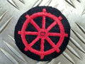 Genuine British Army Wheel Badge Red on Black Felt - NEW