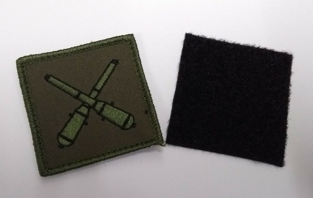 Genuine Issue OD Green Instructor in Gunnery Badge TRF With Backing