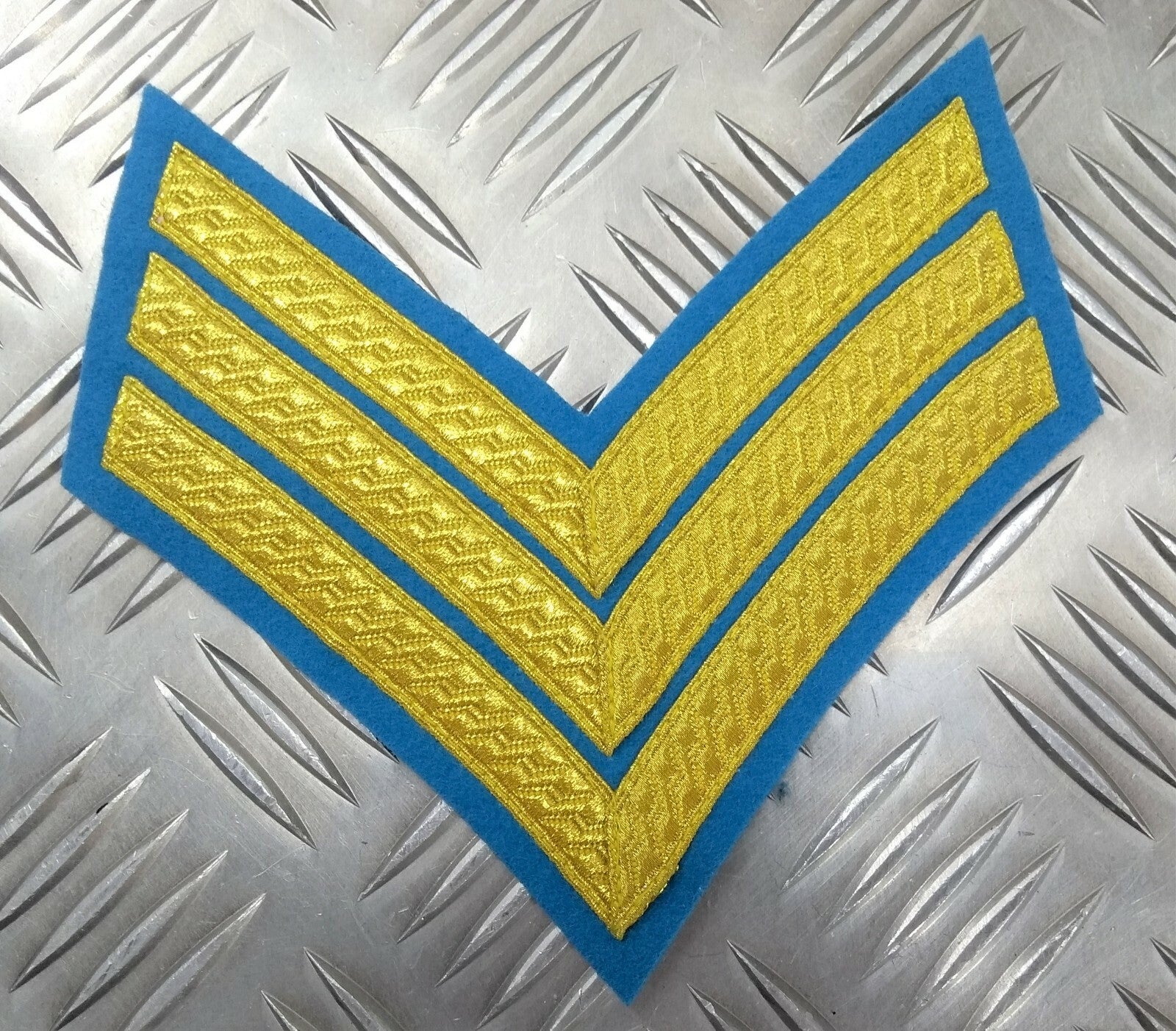 Genuine British Issue Gold 3 Bar Chevrons On Light Blue Felt