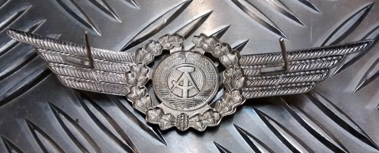 Genuine East German Forces Metal Cap Badge DDR NVA- NEW