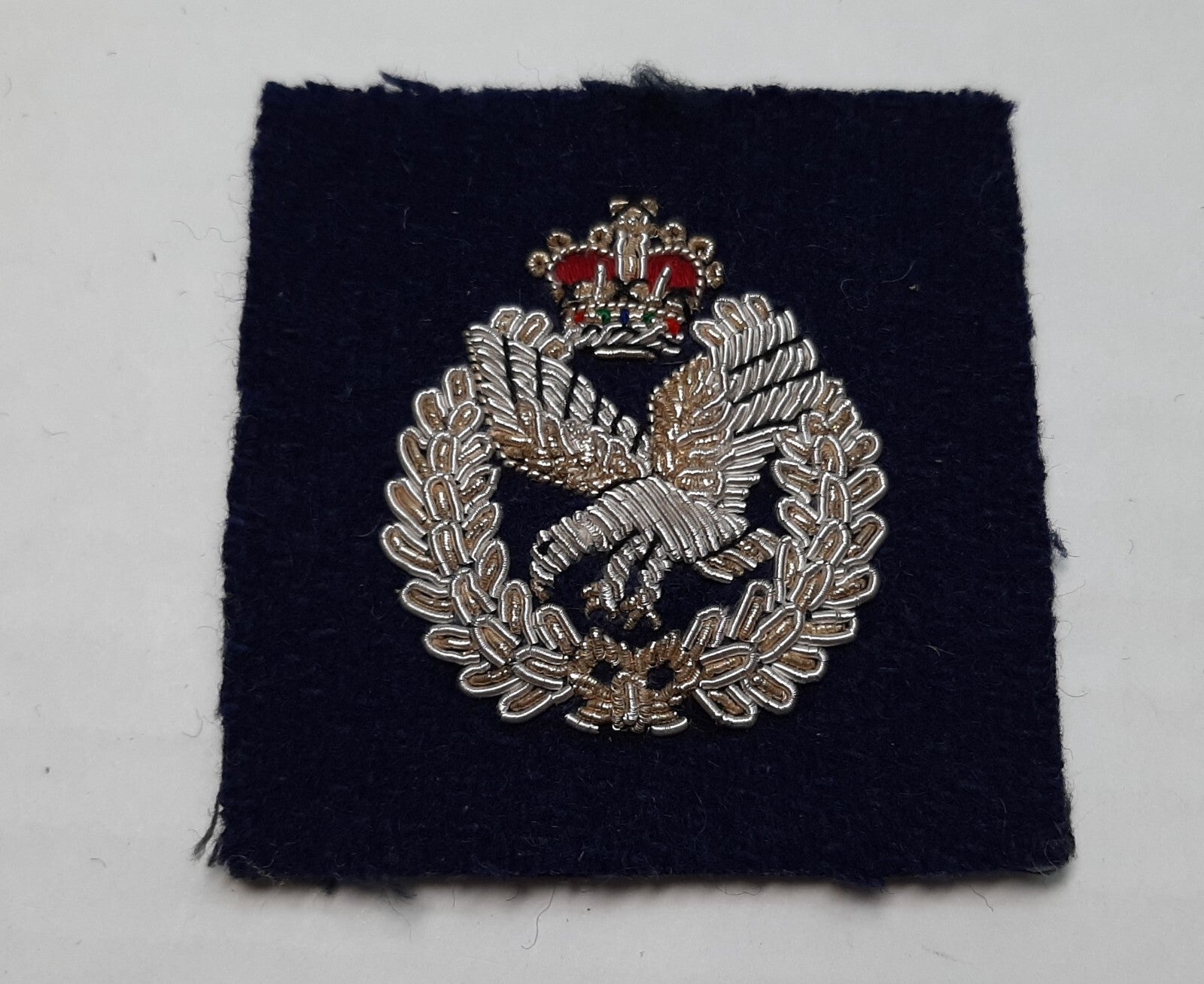 Vintage AAC Beret Badge British Army Air Corps Wire Insignia Patch on Blue NOS
