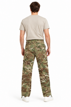Back view of model wearing MTP camo trousers with casual outfit