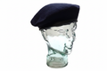 Beret on glass head white background