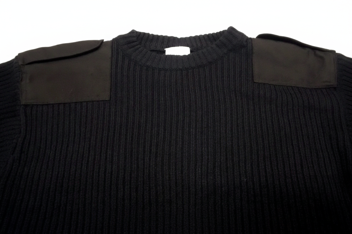 Black jumper shoulder white bg