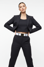 Female fashion model wearing pale belt