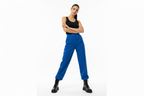 Female model blue trousers - black vest