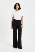 Female model wearing bell bottom trousers from reference