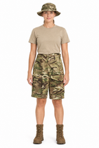 Female soldier wearing the original camouflage shorts with an MTP boonie hat
