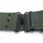 Green belt buckle close-up white bg