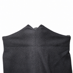 Black wool dress trousers with red piping on a white background