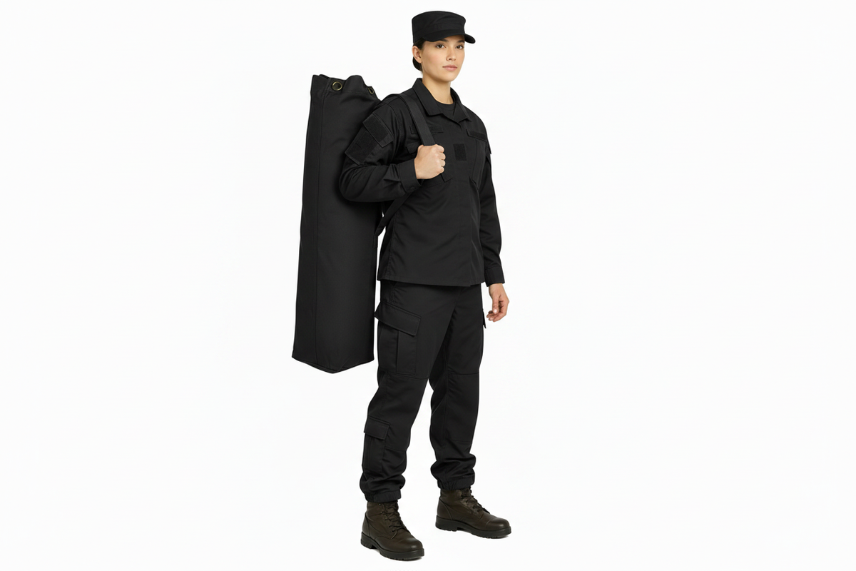 Black kit bag worn by a model