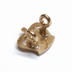 Gold crown badge back view showing pin and loop fitting on white background