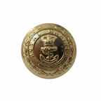 Royal Marines gold dress button close-up on white background