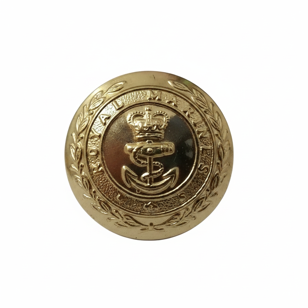 Royal Marines gold dress button close-up on white background