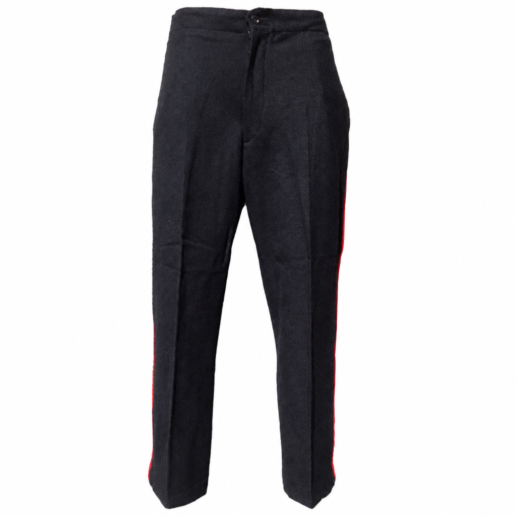 Black wool dress trousers with red piping on a white background