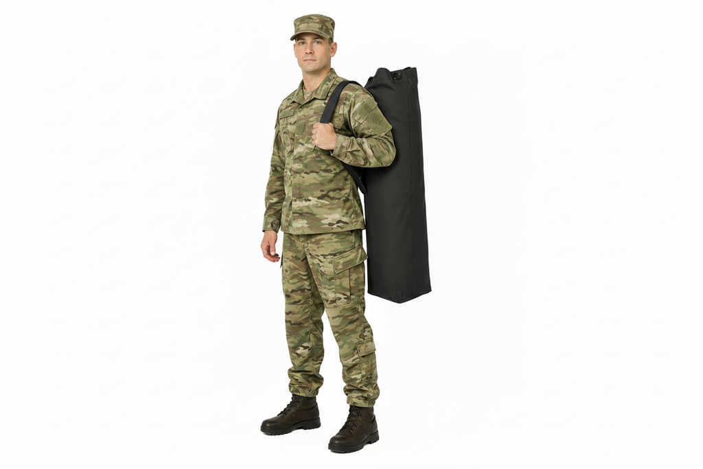 Black military kit bag worn by a soldier on a white background
