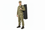 Black military kit bag worn by a soldier on a white background