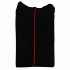 Black wool dress trousers with red piping on a white background