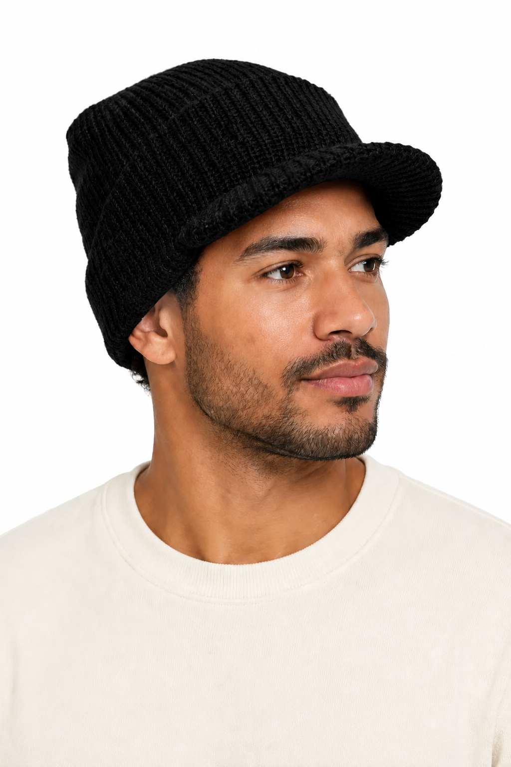 man wearing black peaked wool cap