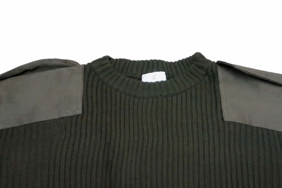 Olive jumper shoulder white bg