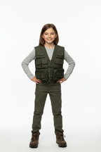 Young girl in adventurer stance wearing olive green combat vest